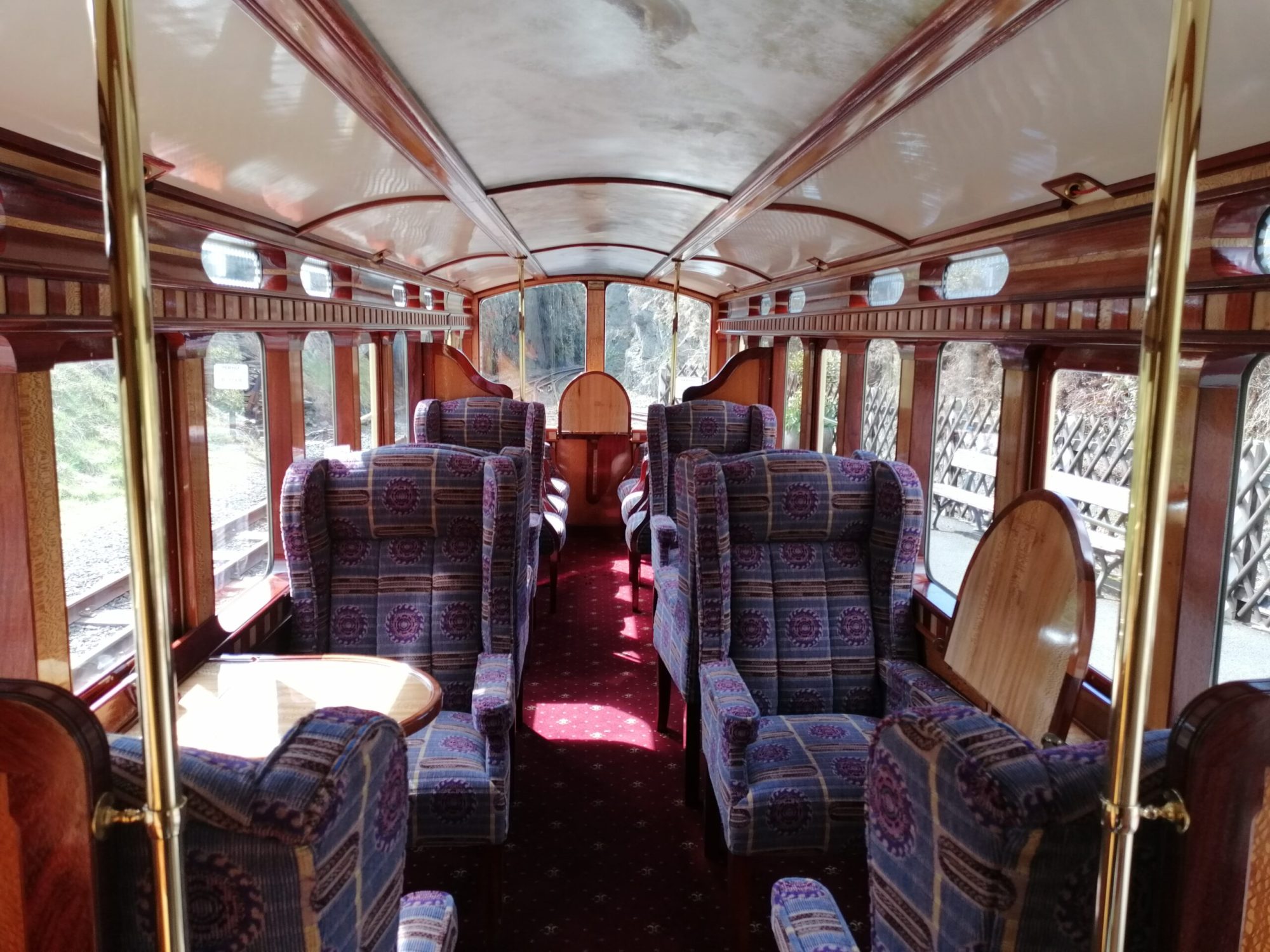 a living room filled with furniture and a large window
