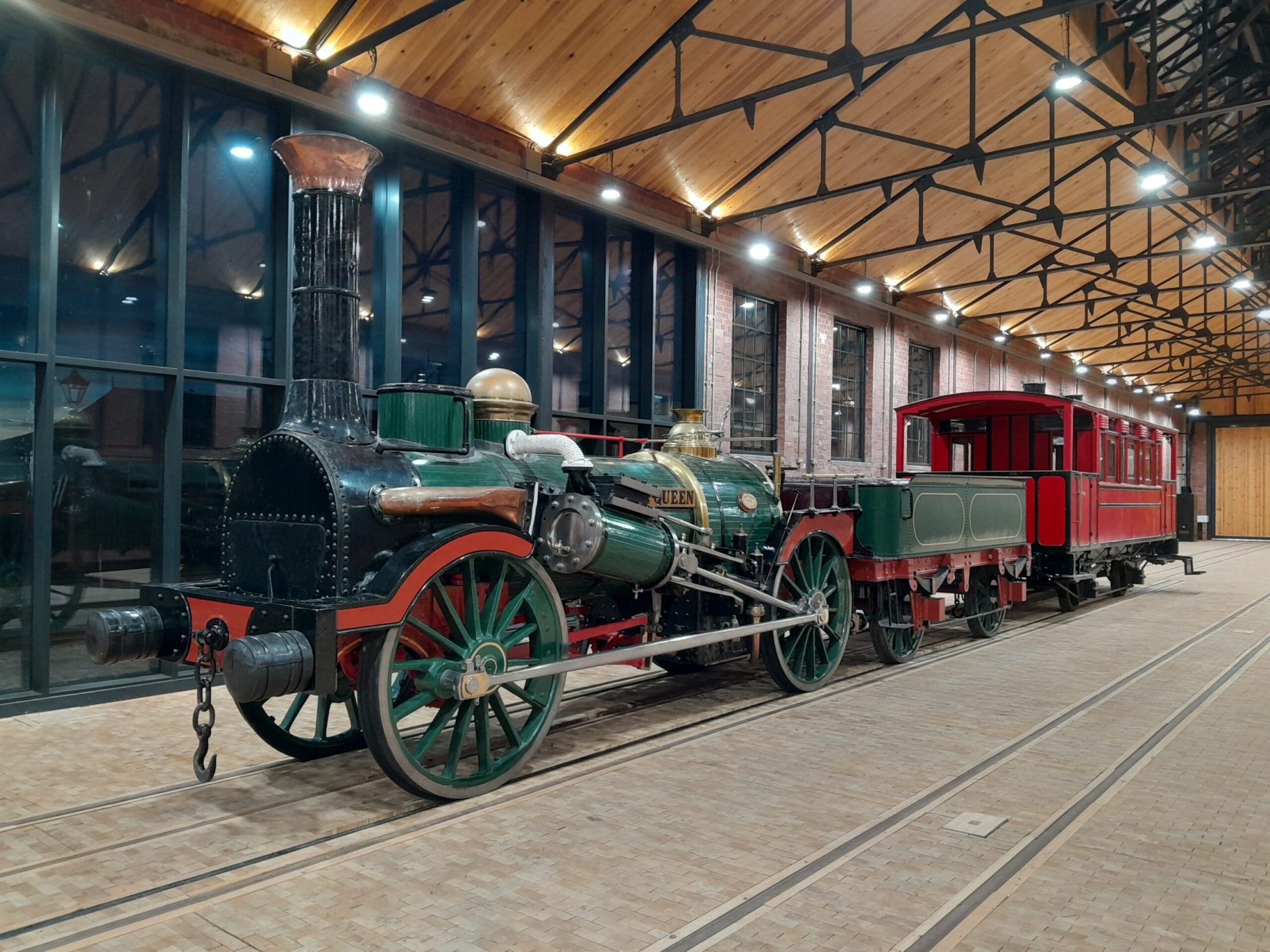 Fire Queen a train is pulled up to a carriage