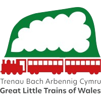 Red train under green mountain with text 'Great Little Trains of Wales'.