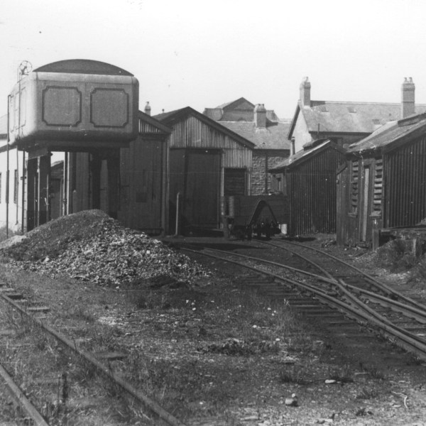 an old photo of a train yard