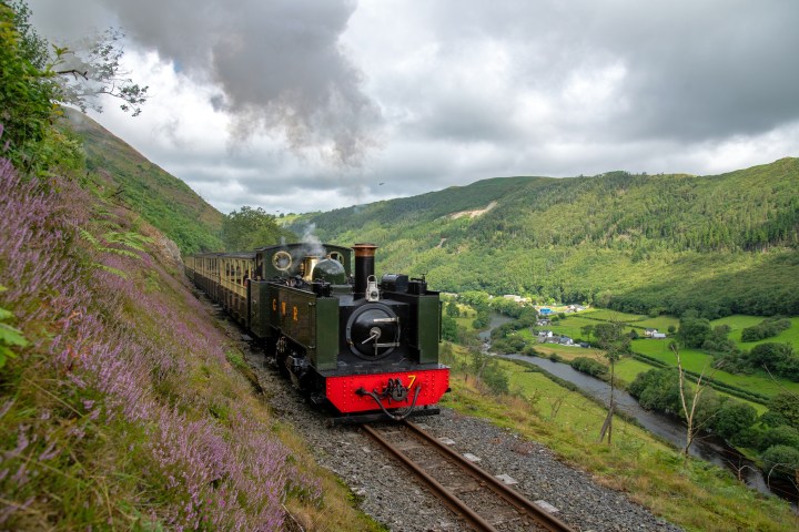 a train is coming down the mountain