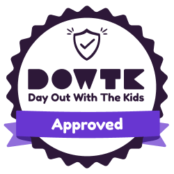 Round badge reading 'DOWTK Day Out With The Kids Approved' with a purple ribbon and shield icon.