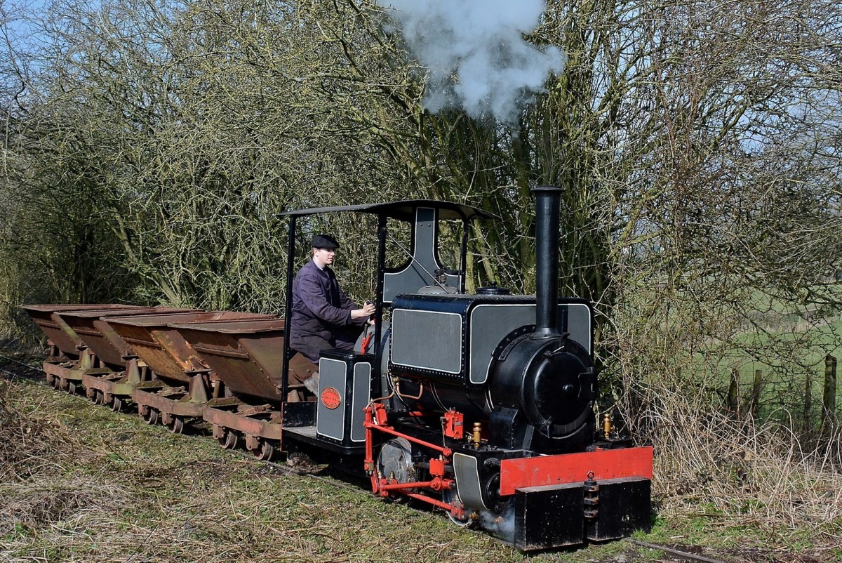 Kerr-Stuart a train that is sitting in the grass