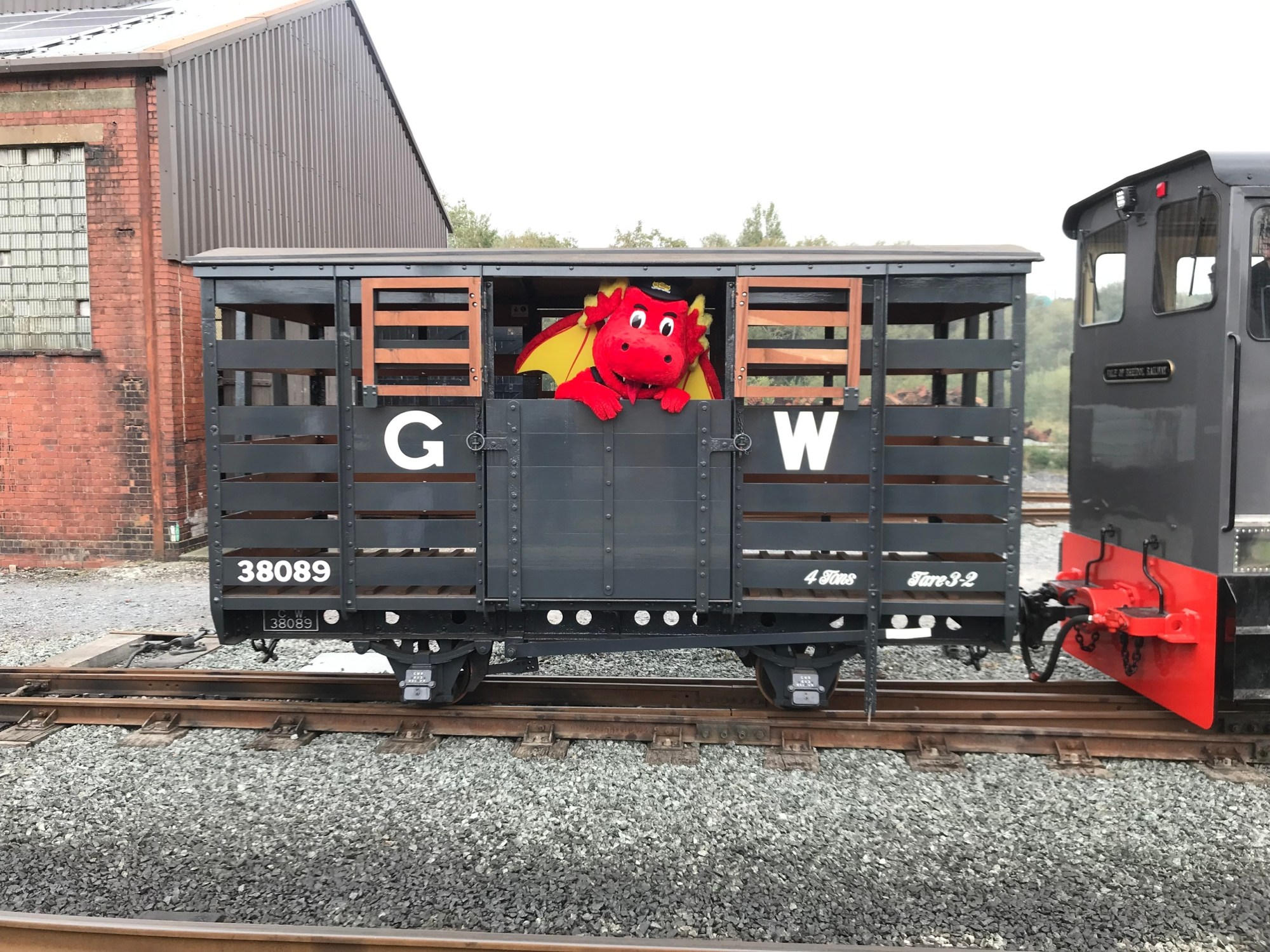 17464411461532-17453958411512-2019-09-15-Gala-15 a train is parked on the side of a building